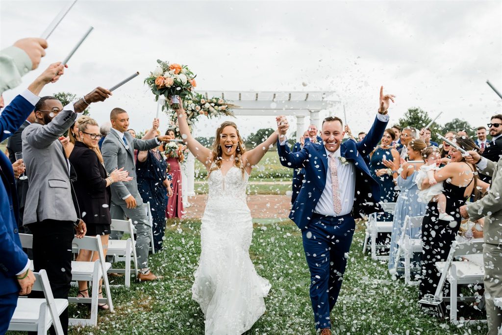 Couple celebrating wedding ceremony at Kent Island Resort